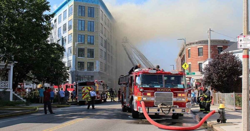 a rescue team strugle to control on fire emergency